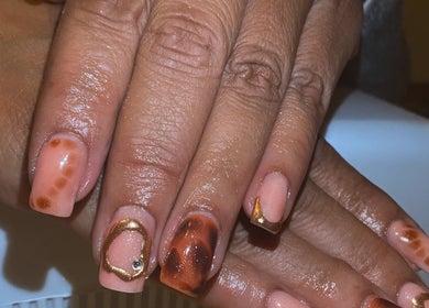 Elegant nail art with golden accents at Arch Design Beauty, Tamworth, England, GB.
