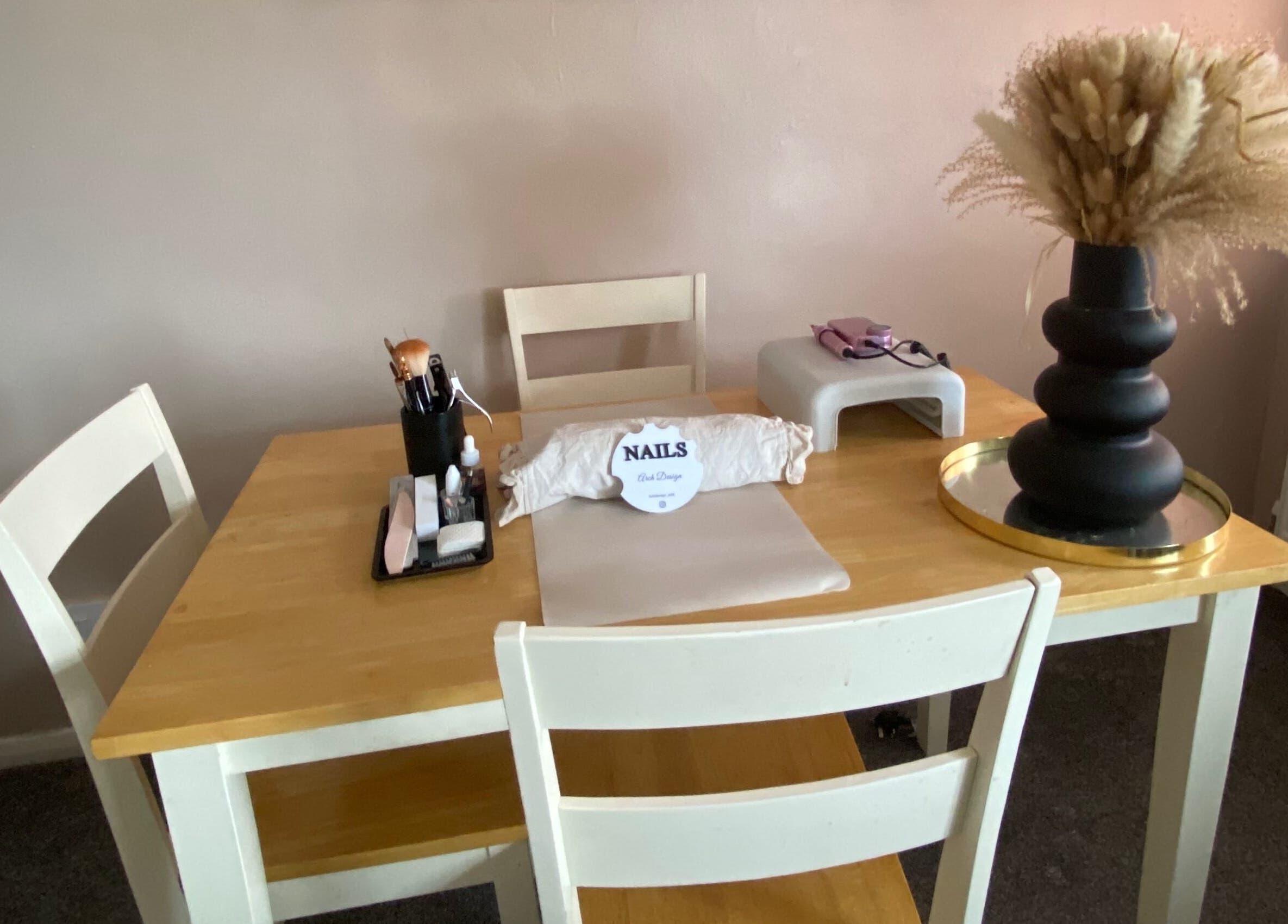 Nail care station at Arch Design Beauty, Tamworth, England, GB with decor and manicure tools.