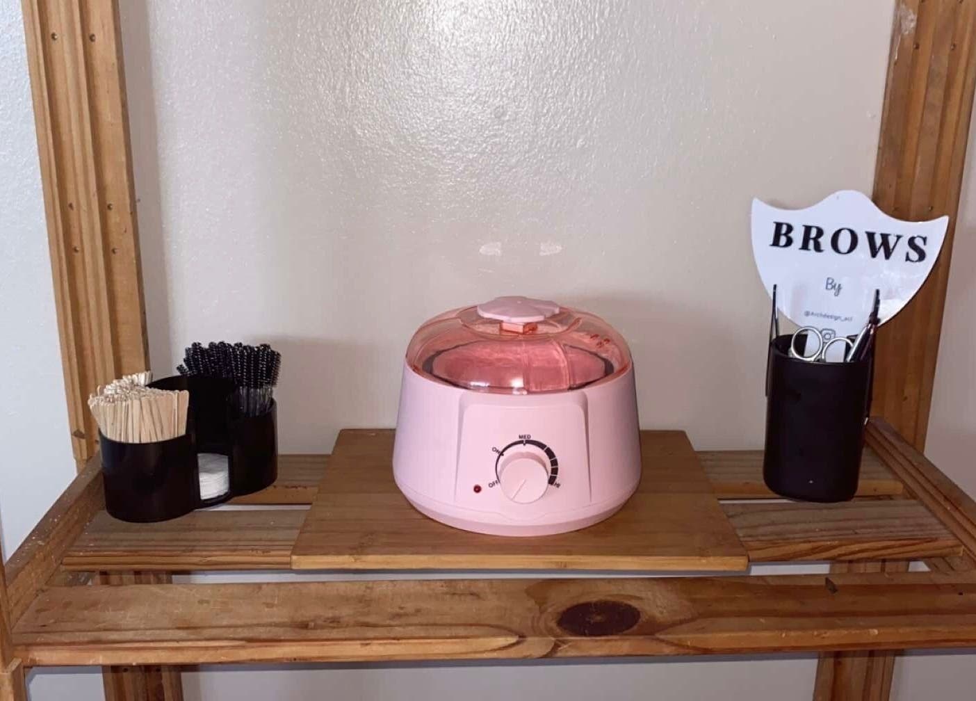 Brow station with waxing pot and tools at Arch Design Beauty, Tamworth, England, GB.