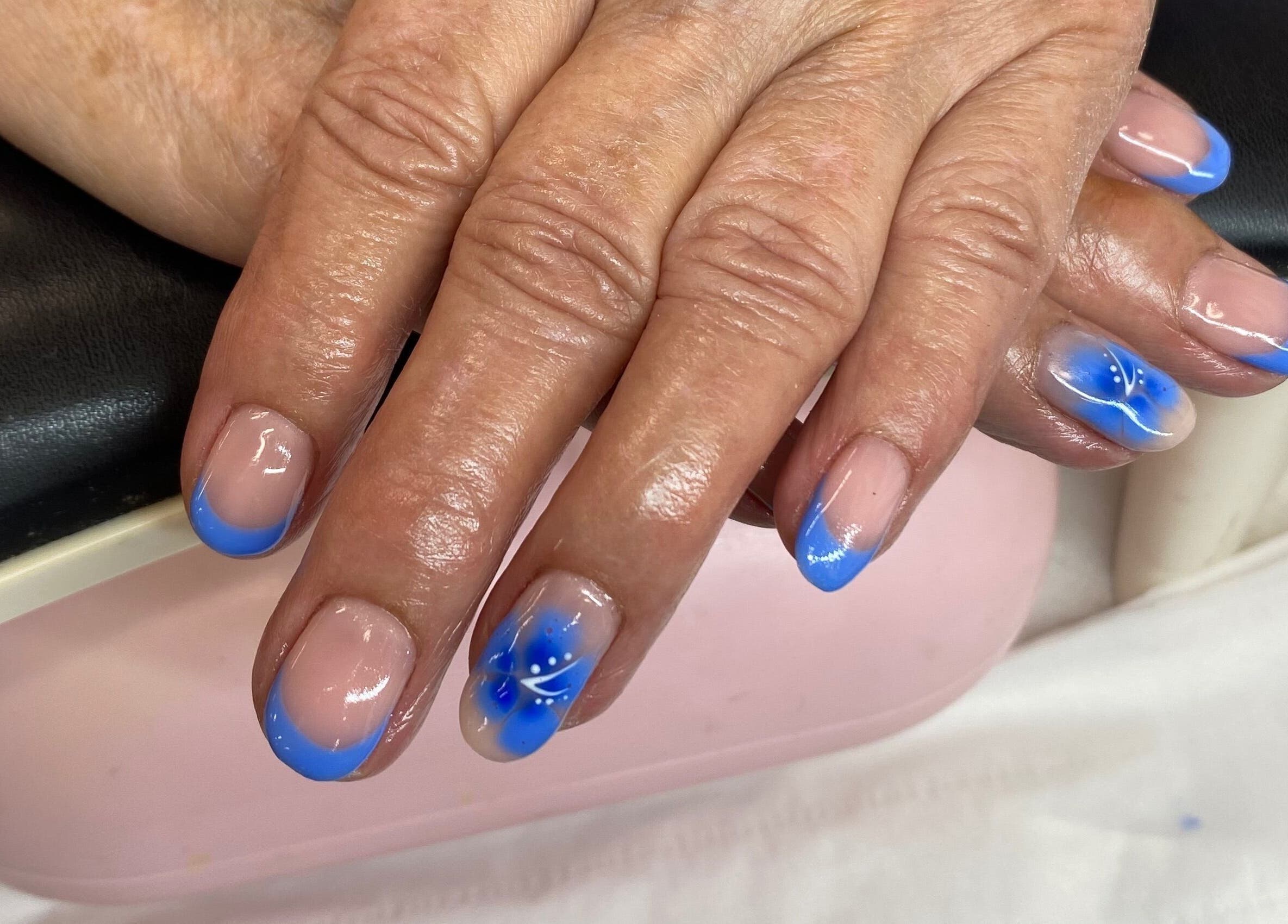 Blue French manicure at Arch Design Beauty in Tamworth, England, GB.