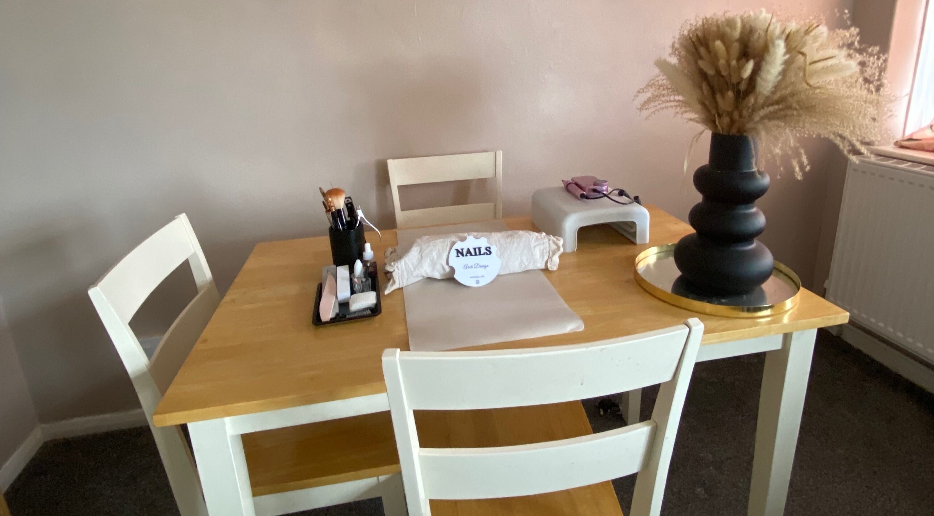 Nail table setup at Arch Design Beauty, Tamworth, England, GB, showcasing tools and decor.