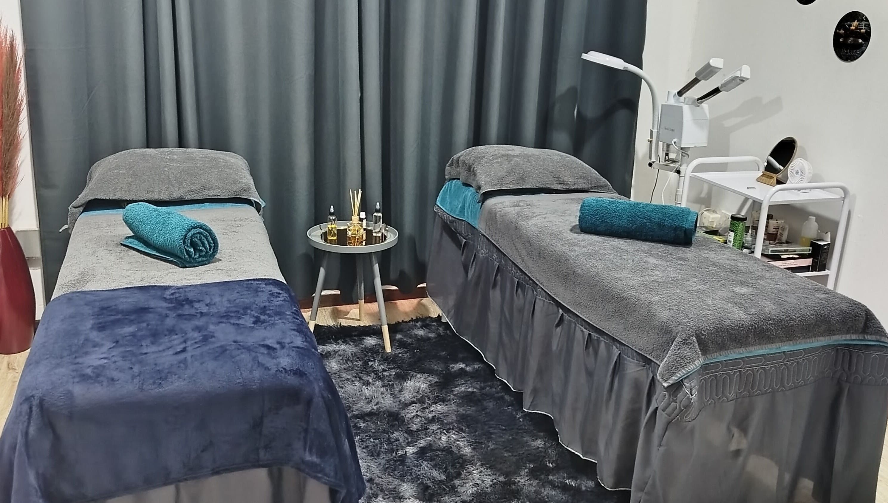Relaxing massage beds at Sparkly Beauty Bar, Johannesburg, Gauteng, ZA, embodying tranquility and elegance.