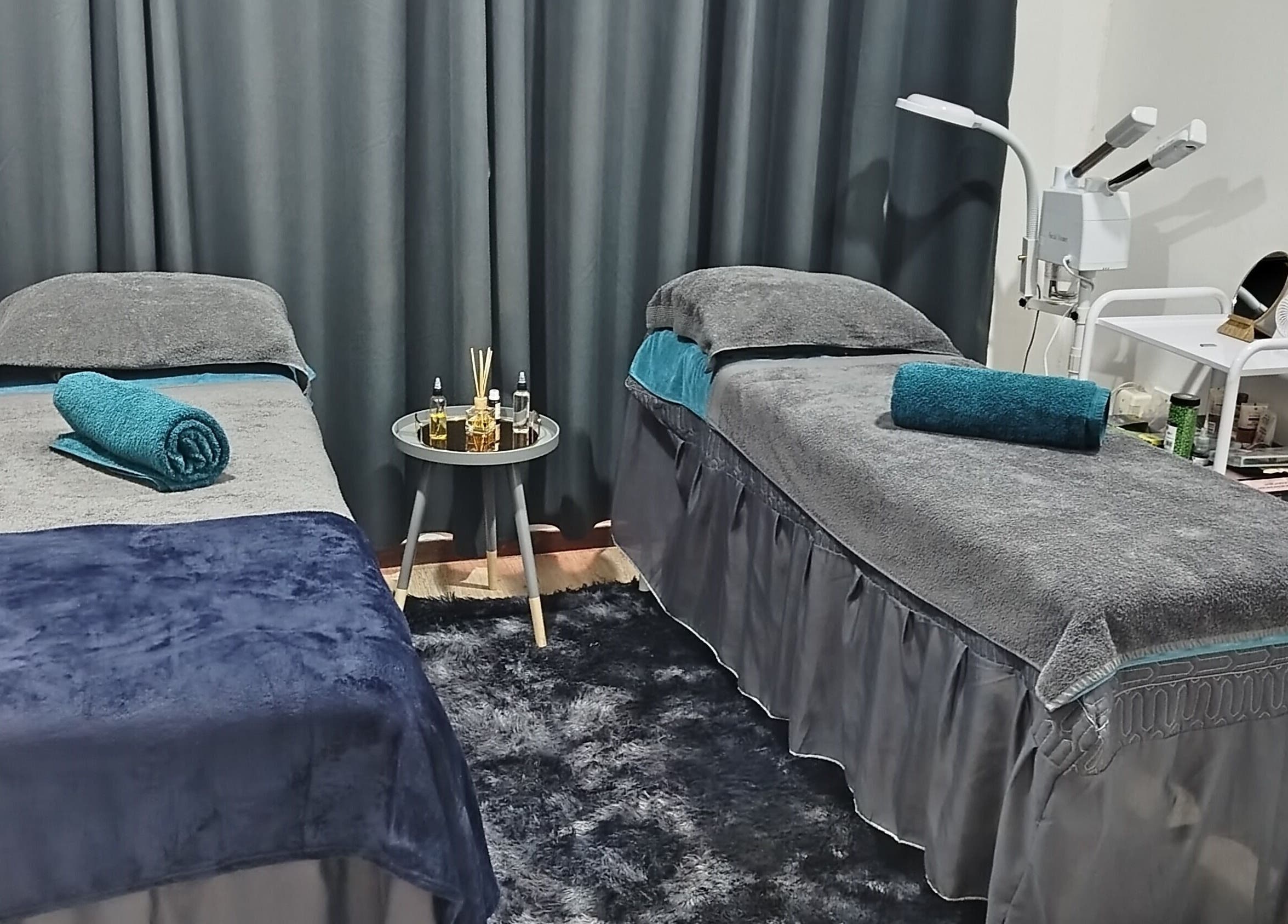 Relaxing massage beds at Sparkly Beauty Bar, Johannesburg, Gauteng, ZA, embodying tranquility and elegance.