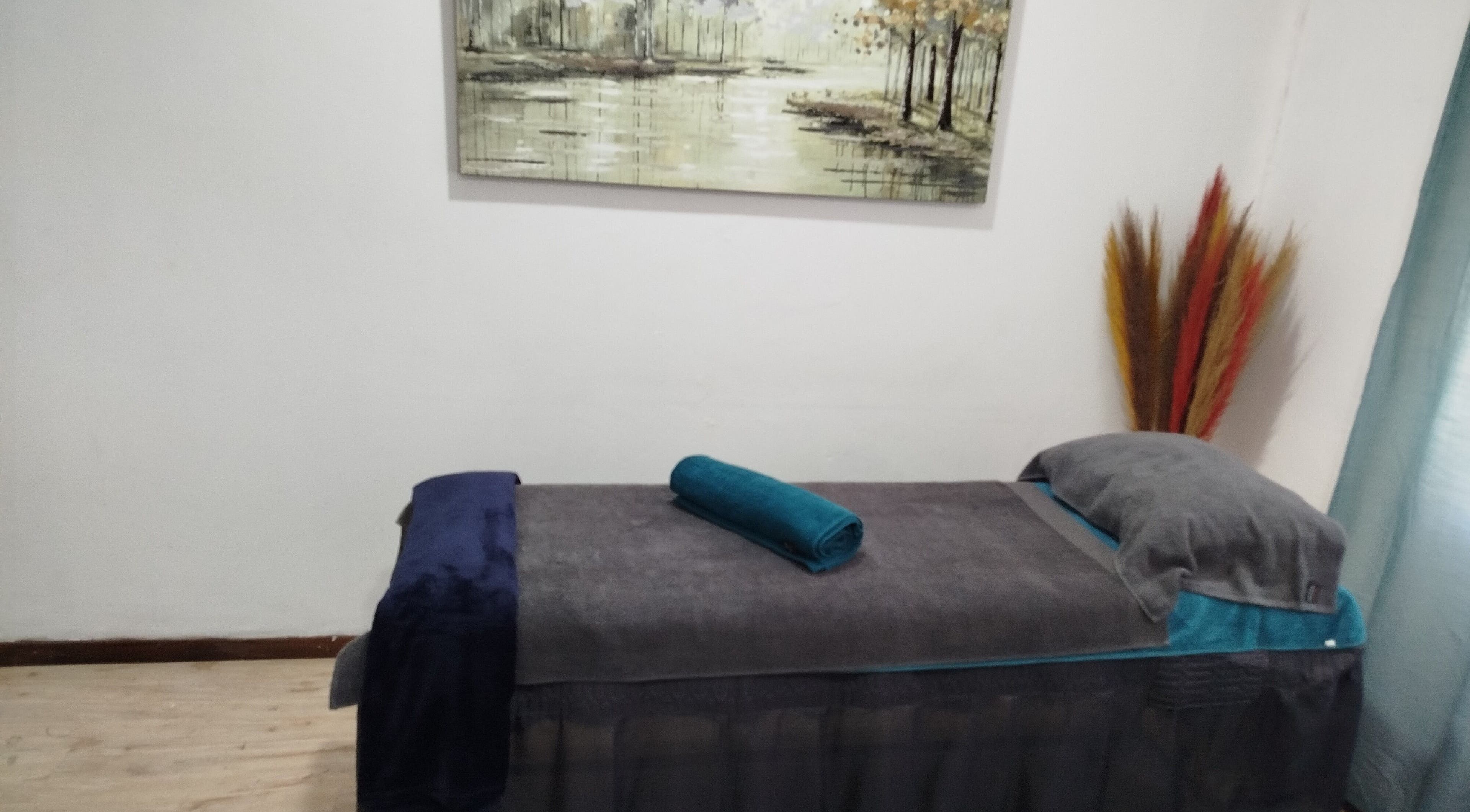 Relaxing massage room at Sparkly Beauty Bar in Johannesburg, Gauteng, ZA, with soothing decor and cozy bed.