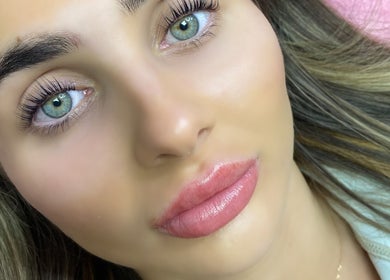 Close-up of glowing skin and lips at Lashandblowbarx, Widnes, England, GB, highlighting beauty services.