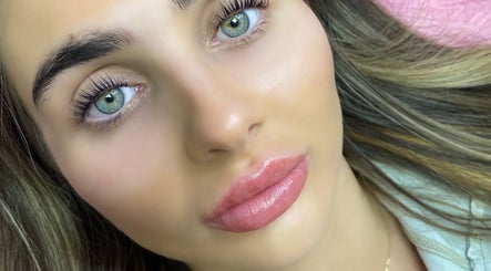 Close-up of glowing skin and lips at Lashandblowbarx, Widnes, England, GB, highlighting beauty services.