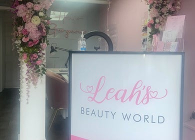 Lashandblowbarx reception with floral decor in Widnes, England, GB, exuding elegance and charm.