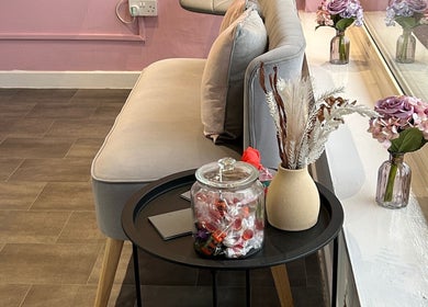 Cozy seating area with elegant decor at Lashandblowbarx, Widnes, England, GB.