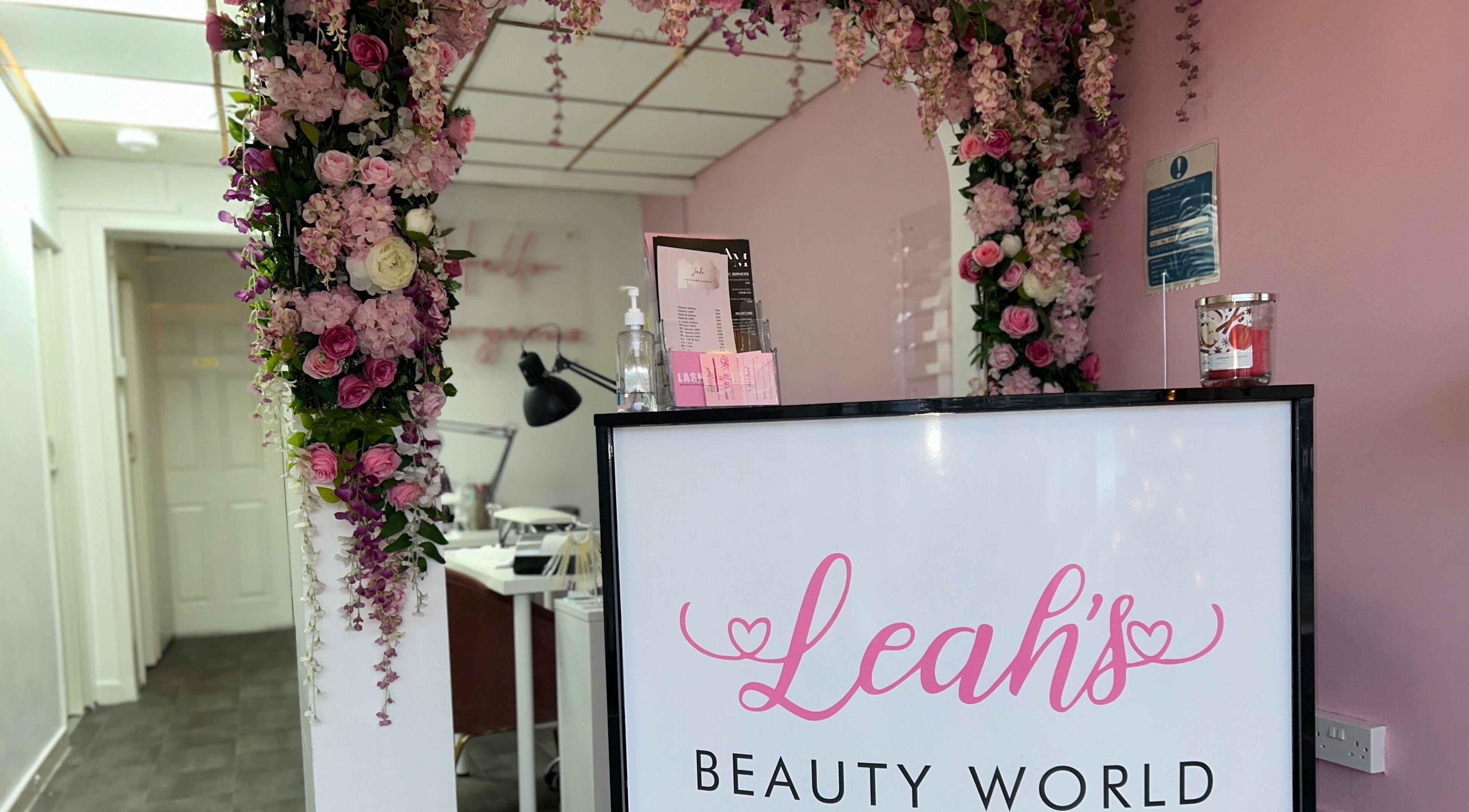 Lashandblowbarx reception area with floral decorations in Widnes, England, GB.