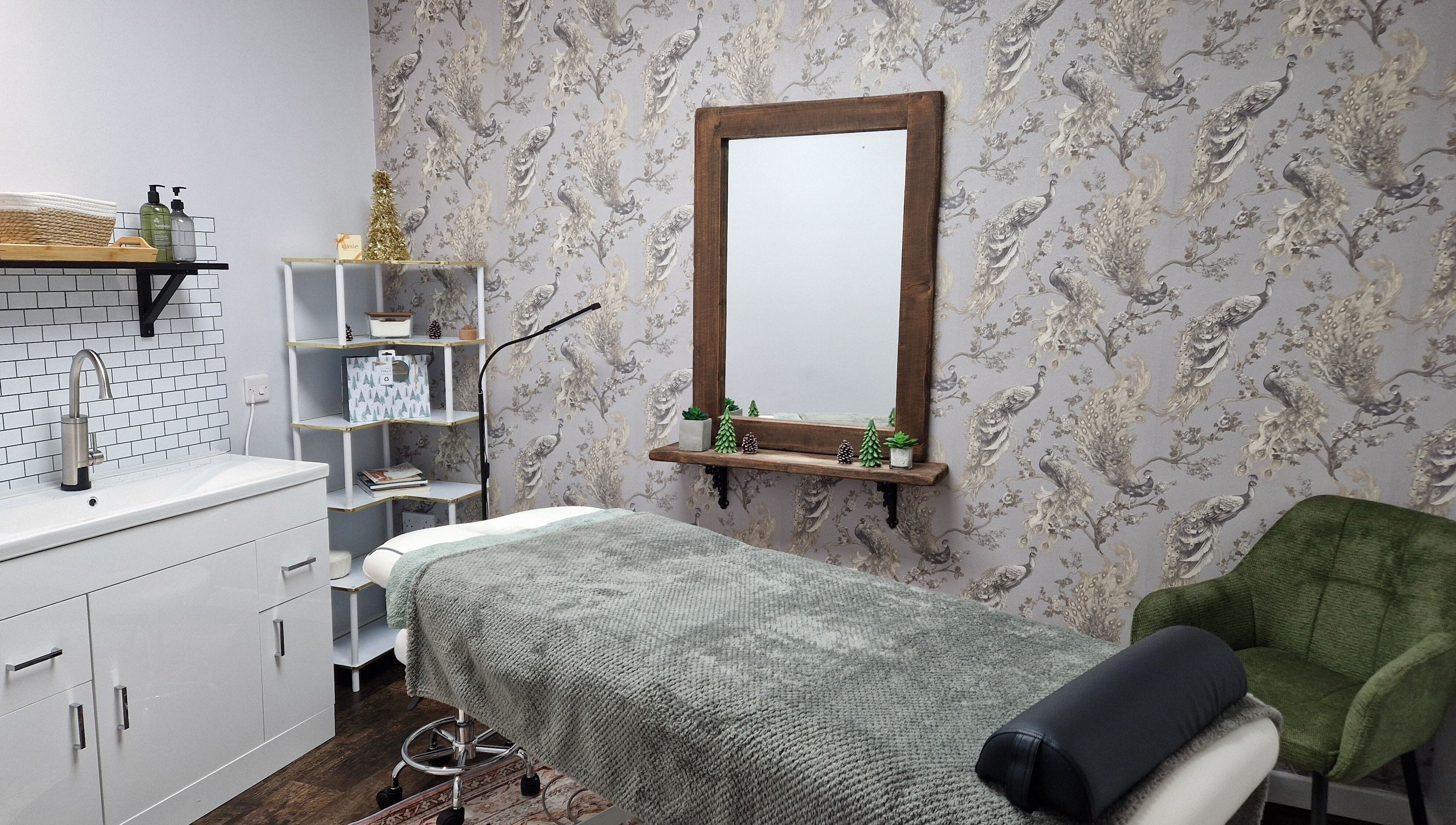 Serene massage room at Peak Performance Soft Tissue Therapy, Kirriemuir, Scotland, GB, featuring elegant decor.