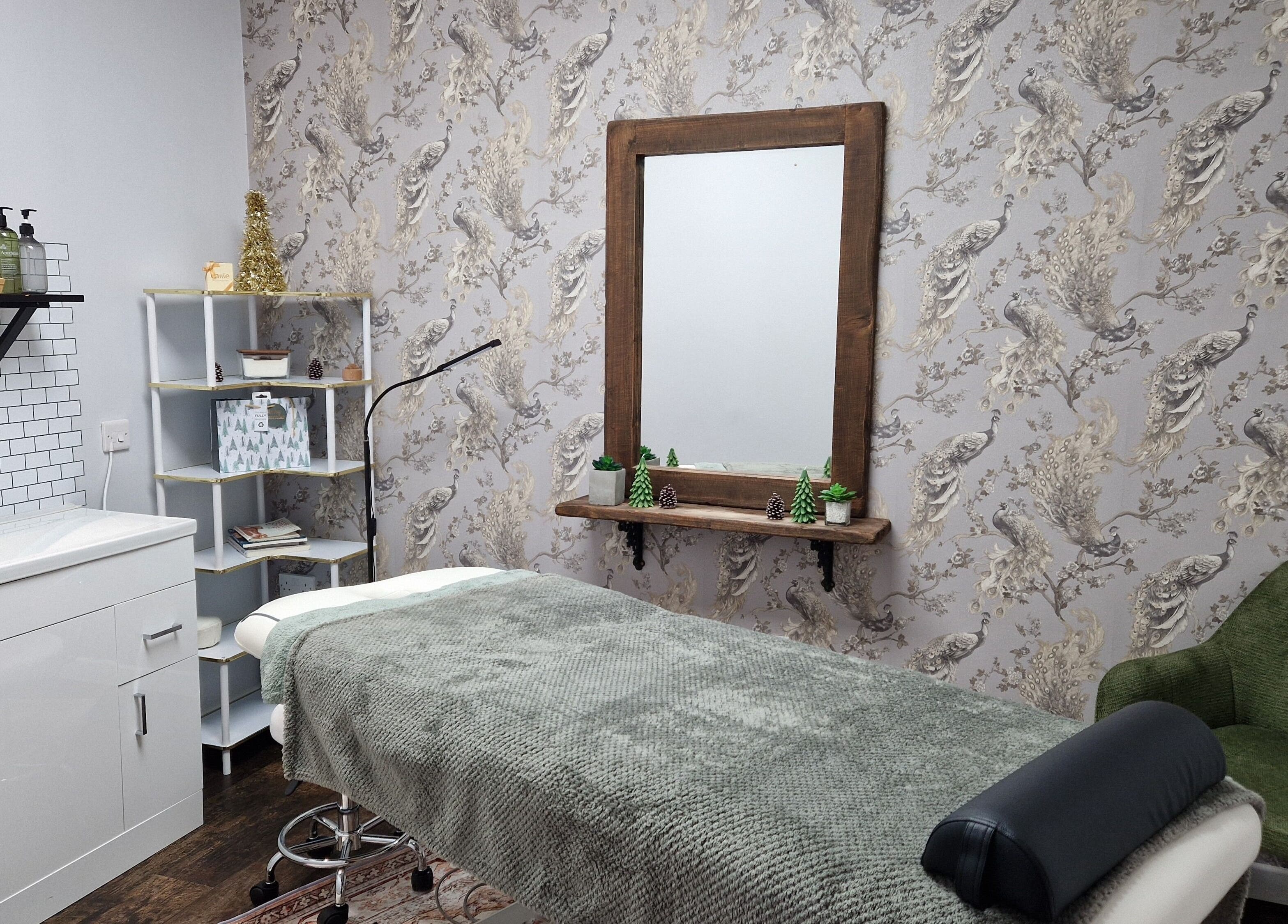 Serene massage room at Peak Performance Soft Tissue Therapy, Kirriemuir, Scotland, GB, featuring elegant decor.