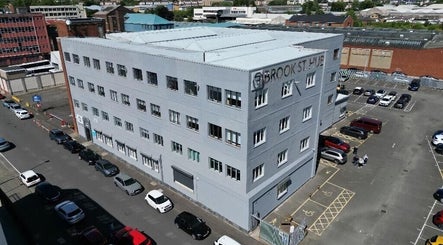 HoVana Holistics & Beauty exterior at Brook St Hub, Glasgow, Scotland, GB, showcasing modern city charm.