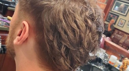 Close-up of a stylish men's haircut at Men's Grooming Lounge By Mel, Mission Viejo, California, US.