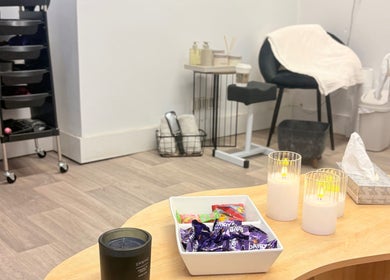 Relaxing space with candles and treats at Skye Beauty, Ashford, England, GB enhancing wellness experience.