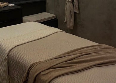 Relaxing massage table at STUDIO LEME DUBAI, Dubai, Dubai, AE, ready for a soothing wellness experience.