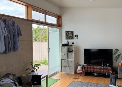 Cozy lounge space at cutsbyhudson, O'connor, Western Australia, with natural light and stylish decor.