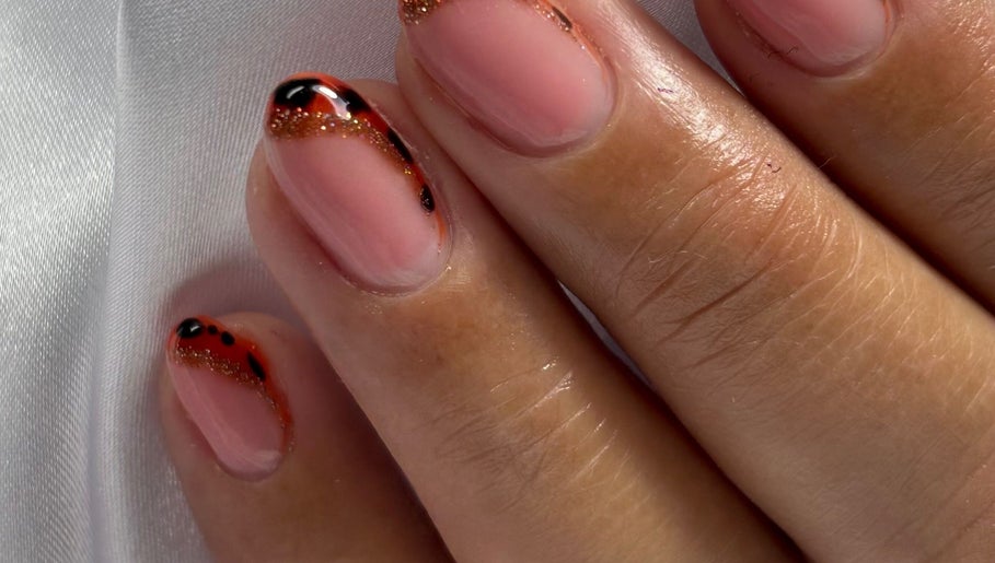 Elegant nail art design at NailVow, Willemstad, Curaçao, CW showcasing intricate color details.
