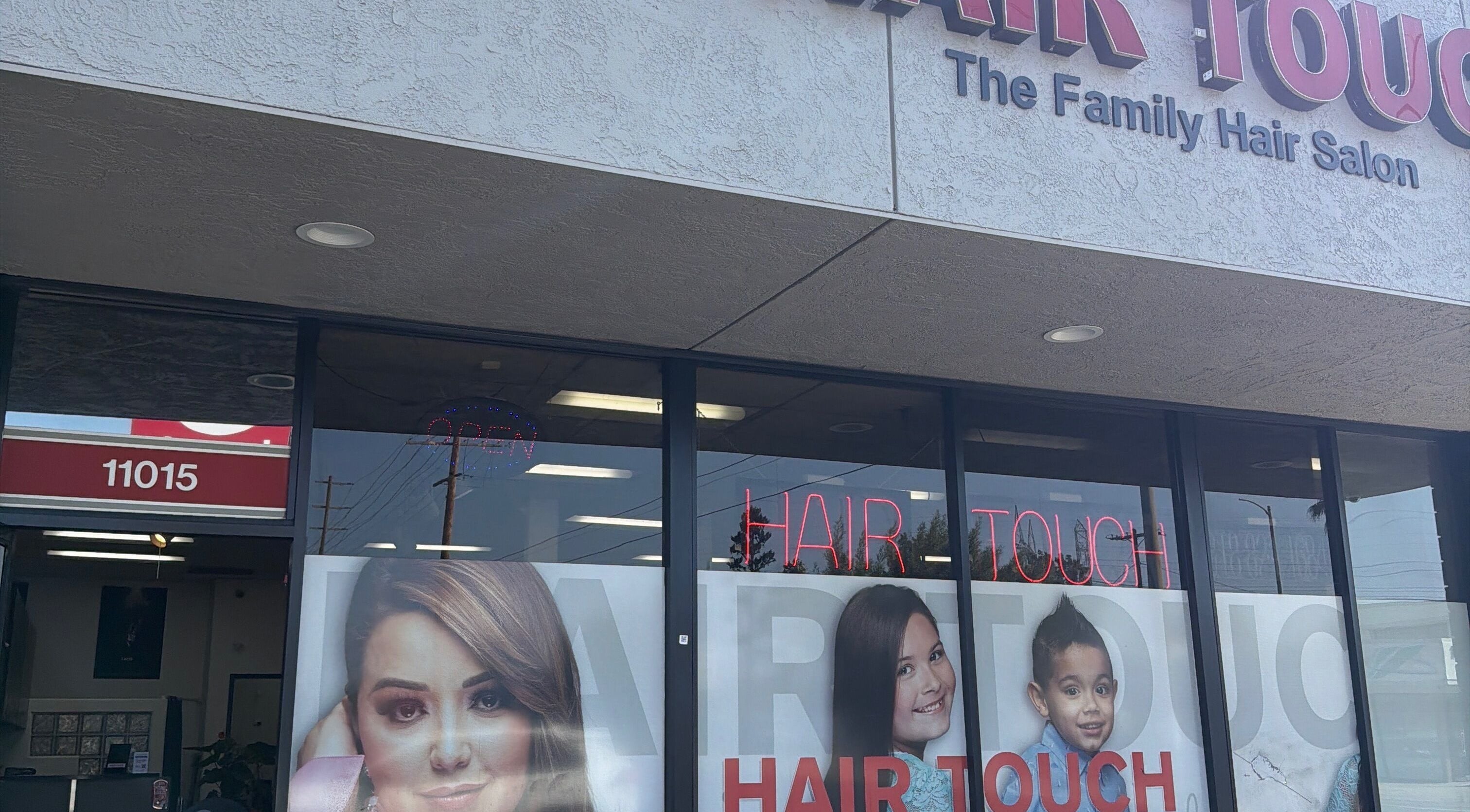Street view of Hair By My Marina, a stylish salon in Los Angeles, California, US with vibrant signage.