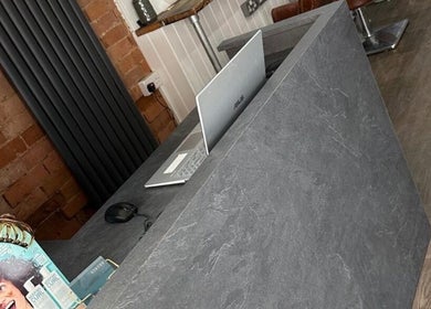 Reception desk at Styled by Beth, Bromsgrove, England, GB featuring modern laptop and stylish decor.