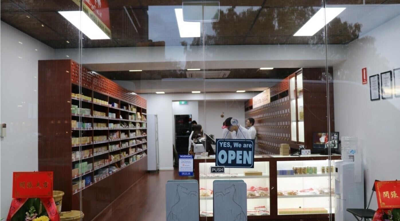 Yu Cao Tang Acupuncture & Chinese Medicine Center in Box Hill, Victoria, AU with open sign and herbal shelves.