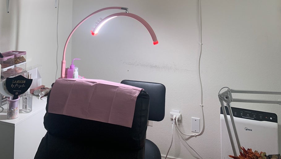 Lash salon station at Lashes by Prizila in Leander, Texas, US, featuring a comfortable chair and lighting.