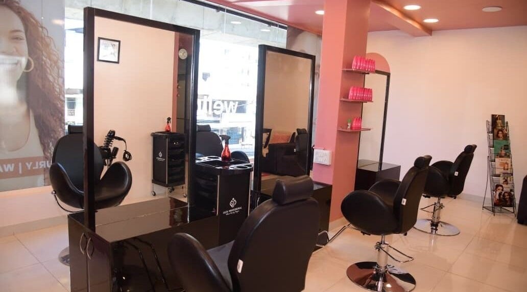 Chic salon interior at Care Wellness Bangalore in Bengaluru, Karnataka, IN with modern styling chairs and mirrors.