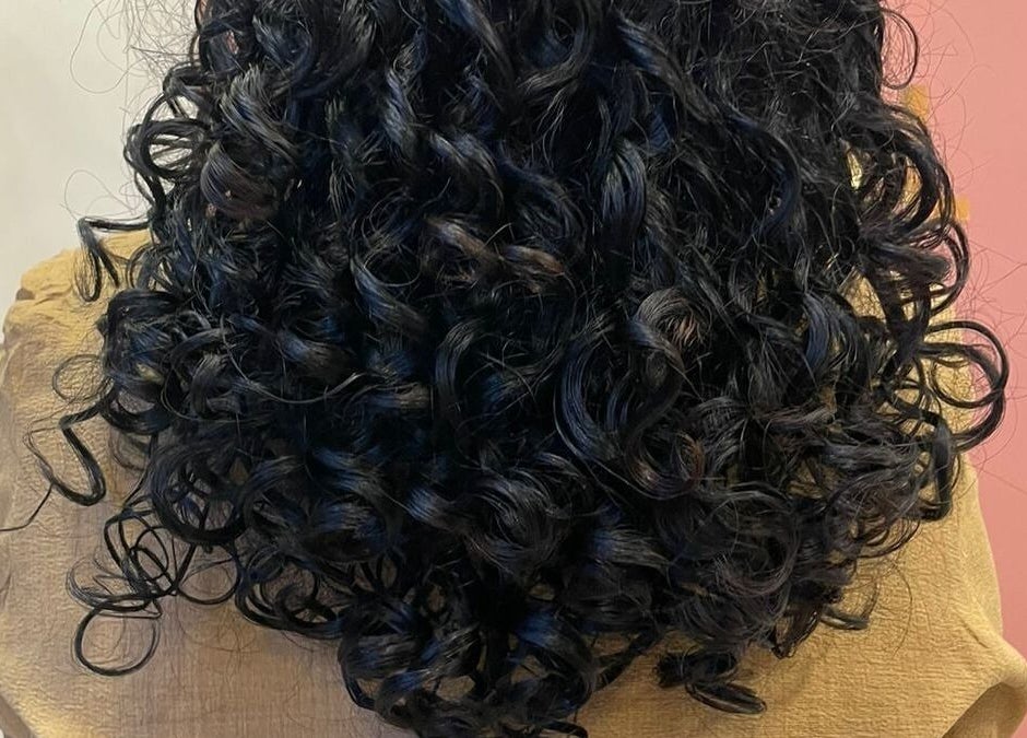 Beautiful curly hairstyle at Care Wellness Bangalore, located in Bengaluru, Karnataka, IN.