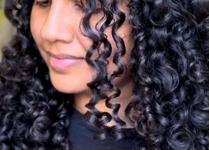 Close-up of beautifully styled curls at Care Wellness Bangalore, Bengaluru, Karnataka, IN.