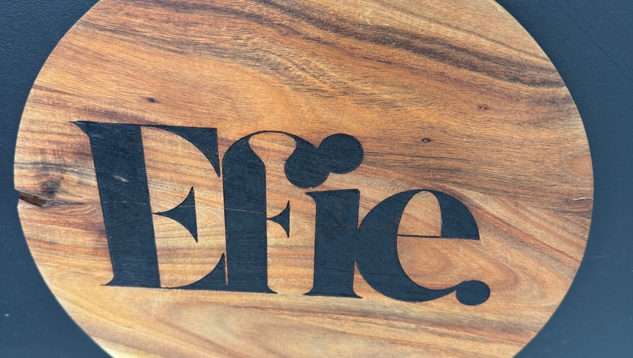 Efie Beauty & Aesthetics logo on a wooden background in Cannock, England, GB.