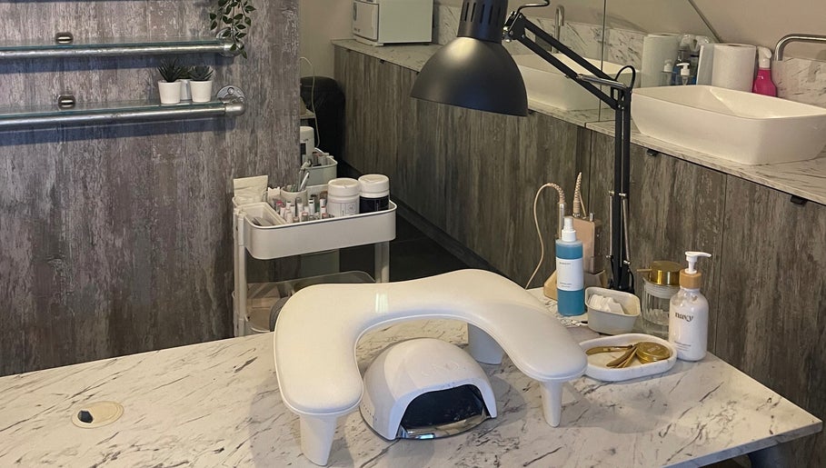 Modern nail station at By Sam - Nail Artist in Edinburgh, Scotland, GB, featuring tools and products.