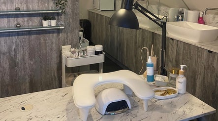 Modern nail station at By Sam - Nail Artist in Edinburgh, Scotland, GB, featuring tools and products.