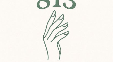 Elegant logo of 813 Nail Collective, Riverview, Florida, featuring graceful hand design.