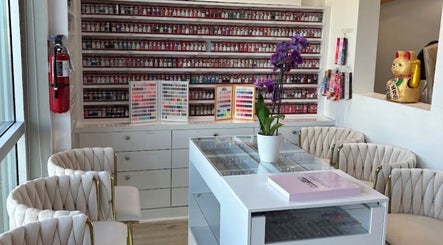 Chic interior of 813 Nail Collective with vibrant polishes, Riverview, Florida, US.