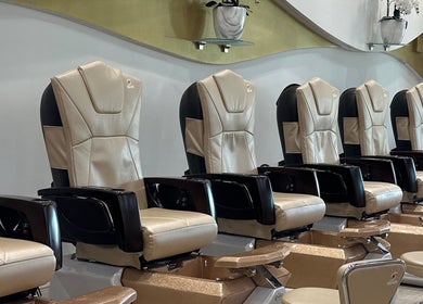 Elegant pedicure chairs at 813 Nail Collective in Riverview, Florida, US, offering premium relaxation.