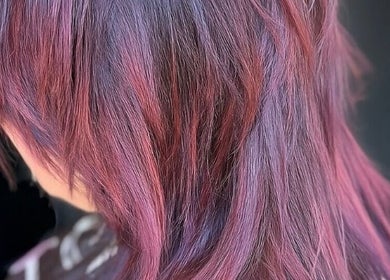 Vibrant purple hair styled at Hair by Jodie at Efie, Cannock, England, GB.