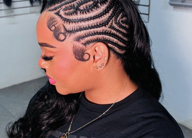 Intricate braided hairstyle at Drisys's Hairdo Beauty Studio, Koolbaai, Sint Maarten, SX.