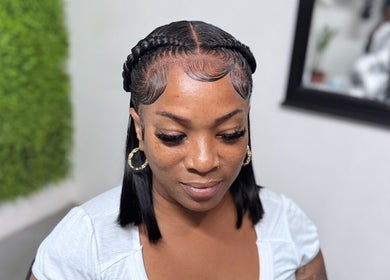 Elegant braided hairstyle at Drisy’s Hairdo Beauty Studio in Koolbaai, Sint Maarten, SX.