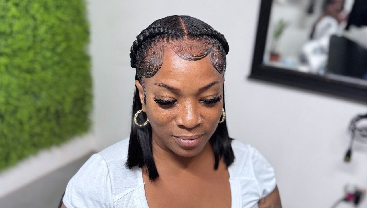 Woman showcasing stylish braids at Drisy’s Hairdo Beauty Studio, Koolbaai, Sint Maarten, SX.