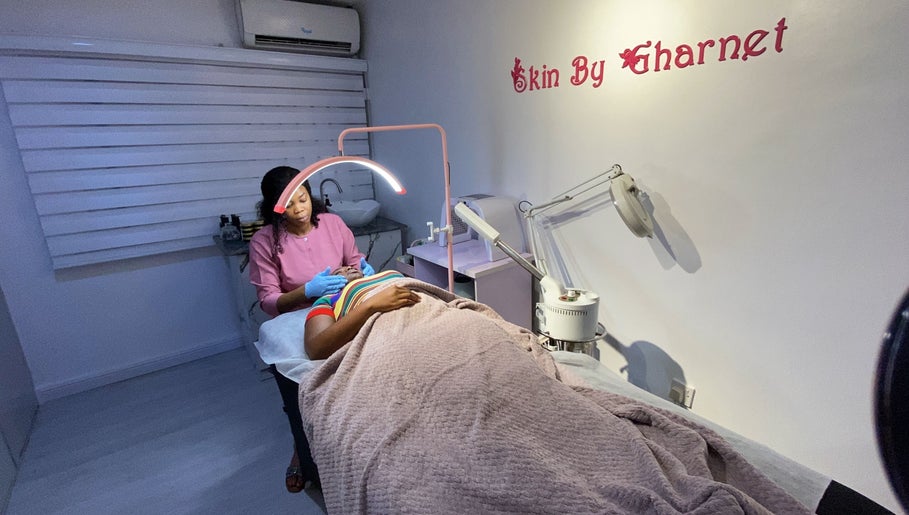 Aesthetic treatment at SkinByGharnet in Lagos, Lagos, NG, featuring a facial session with a professional therapist.