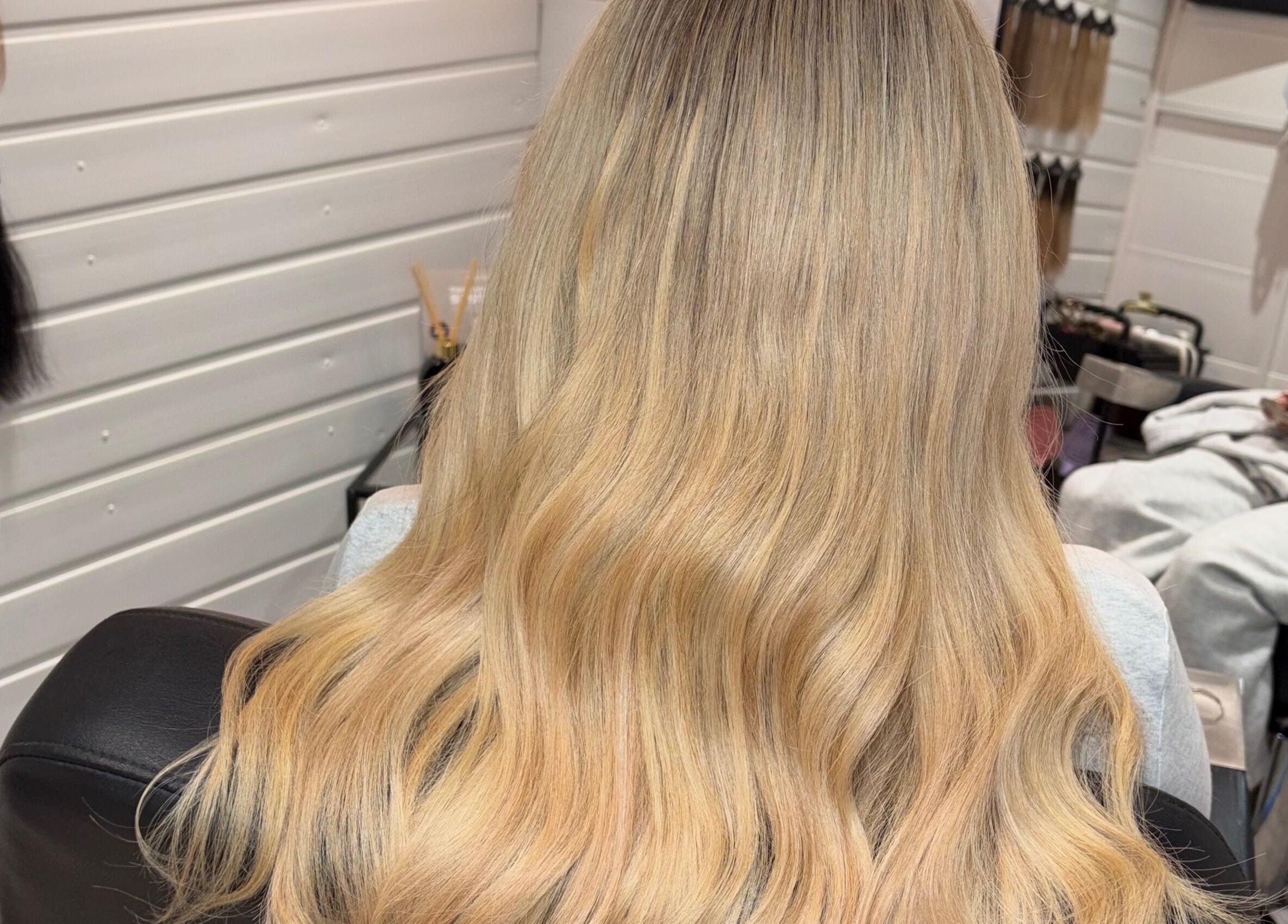 Blonde wavy hair styled at Enhancedbysummer salon, Thrapston, England, GB.