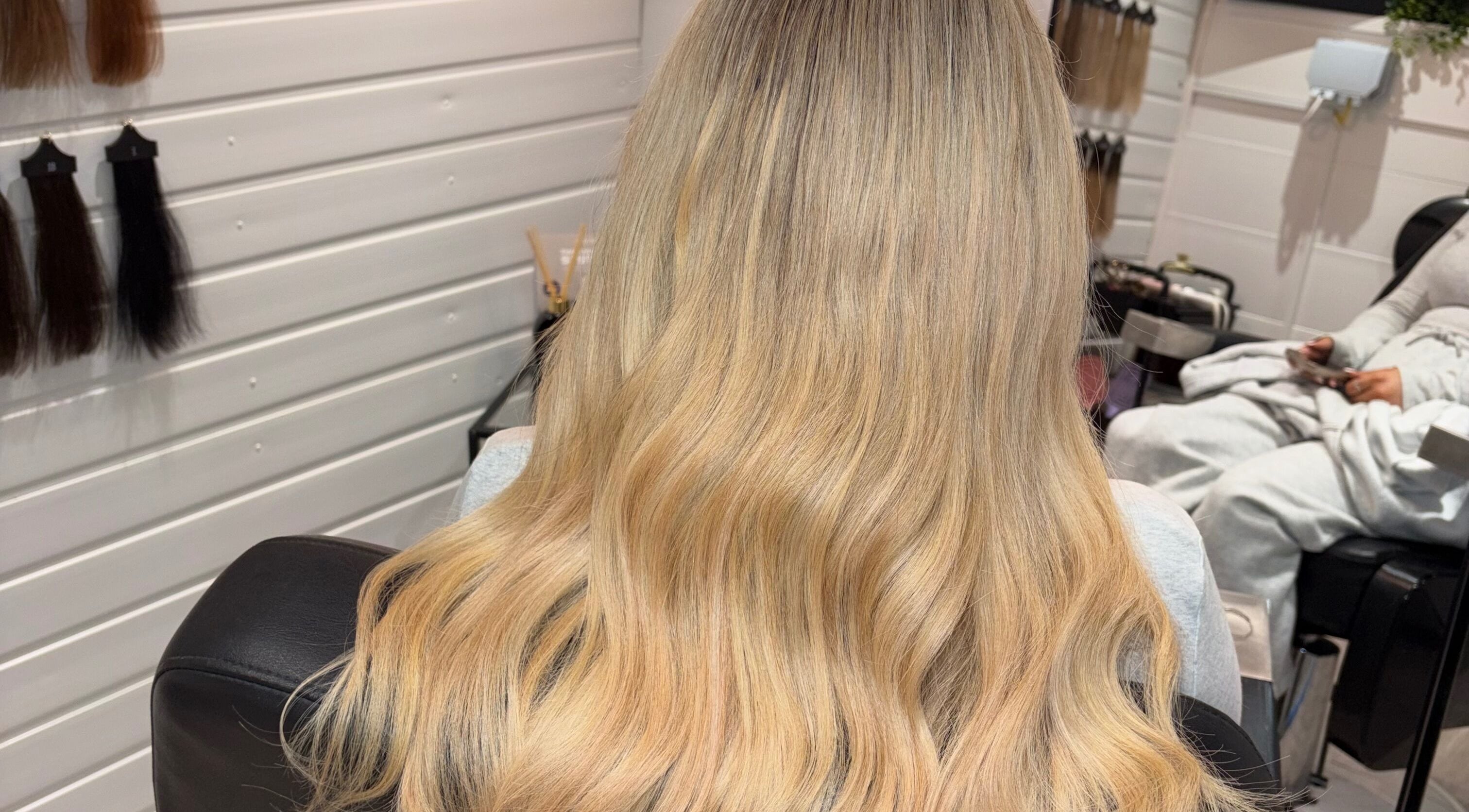 Blonde wavy hair styled at Enhancedbysummer salon, Thrapston, England, GB.