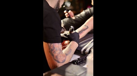 Tattoo artist working at Hutsul, Ixelles, Bruxelles, BE.