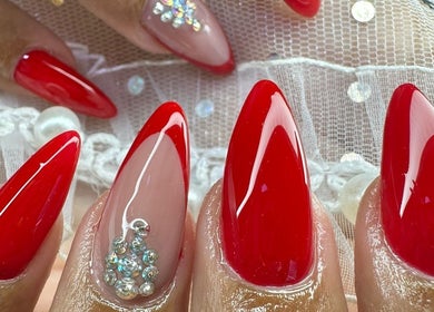 Elegant red nails with rhinestones at The Rich Brave Studio, Willemstad, Curaçao, CW.