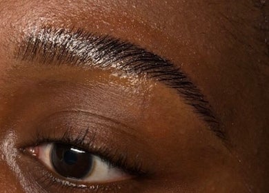 Close-up of well-groomed eyebrow at S.Sleek, Bolton, England, GB, showcasing professional beauty care.