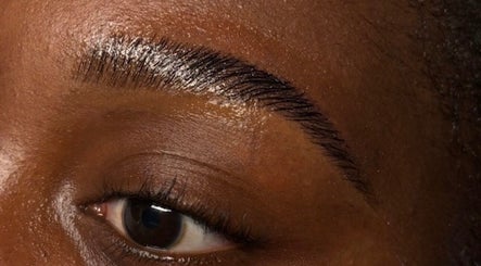 Close-up of well-groomed eyebrow at S.Sleek, Bolton, England, GB, showcasing professional beauty care.