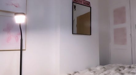 Serene beauty room at Beauty By Faith in Abbots Langley, England, GB, featuring a soft bed and gentle lighting.