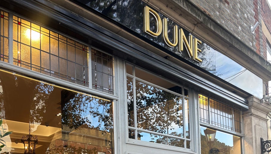 Classic exterior of Mia's Beauty Room, Poole, England, GB, featuring large windows and exquisite details.