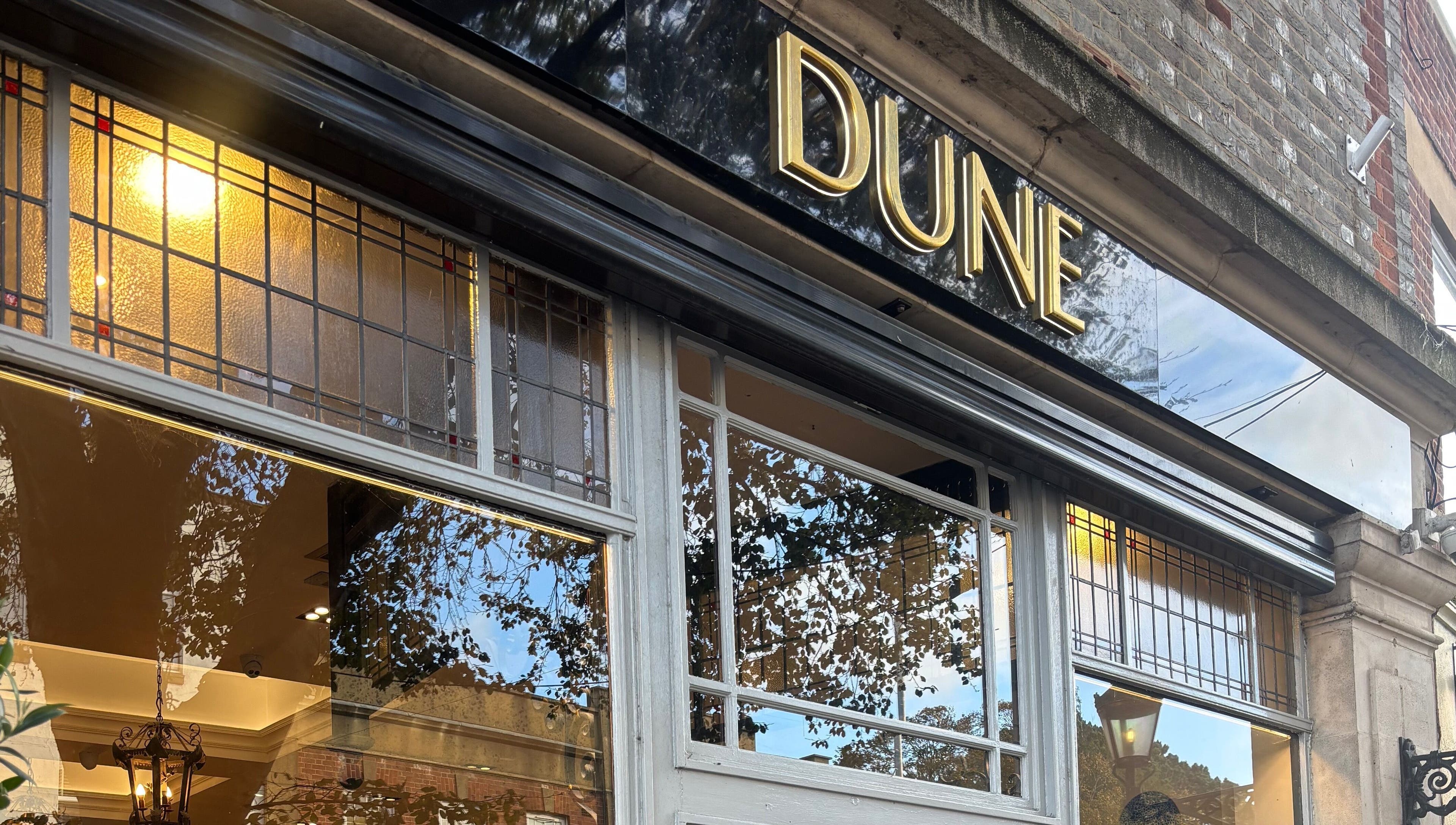 Classic exterior of Mia's Beauty Room, Poole, England, GB, featuring large windows and exquisite details.