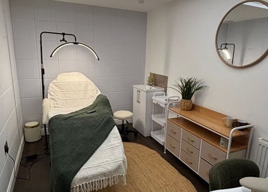 Relaxing treatment room at Mia's Beauty Room in Poole, England, GB with a comfortable spa bed and soothing decor.
