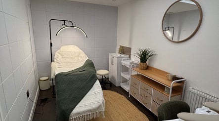 Relaxing treatment room at Mia's Beauty Room in Poole, England, GB with a comfortable spa bed and soothing decor.